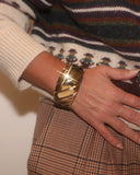Bracelet large doré et strié