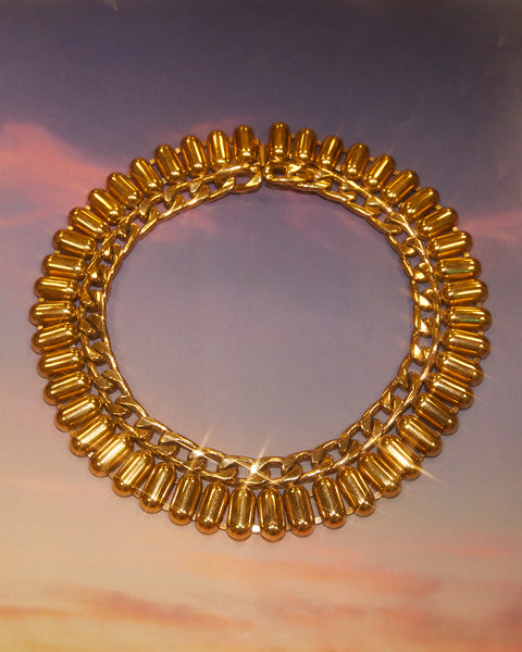 Collier graphique doré à louer