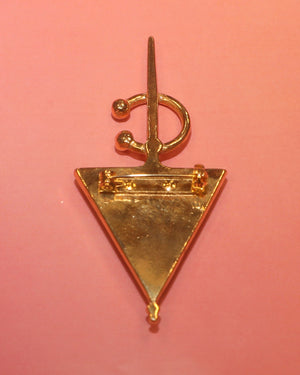 Broche triangulaire or et cabochons
