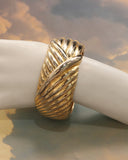 Bracelet rigide drapé