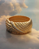 Bracelet rigide drapé