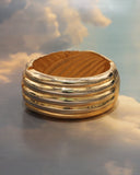 Bracelet rigide drapé