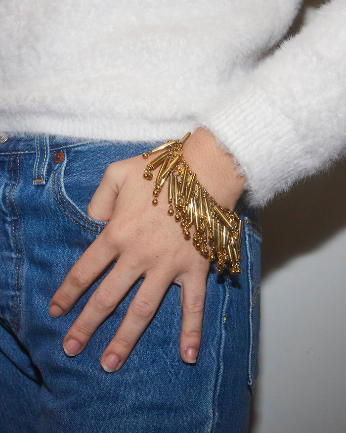 Bracelet pampilles en perles dorées