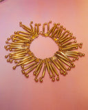 Bracelet pampilles en perles dorées