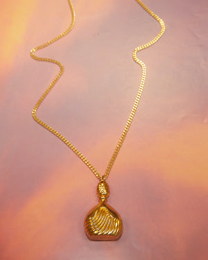 Pendentif parfum Ted Lapidus