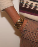 Bracelet large doré et strié