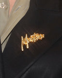 Broche Claude Montana