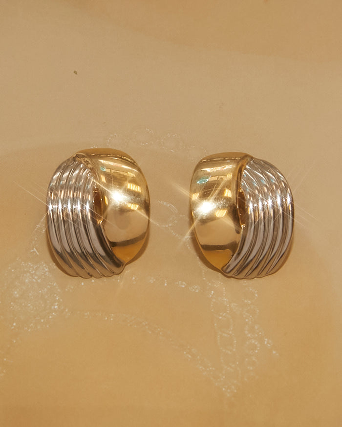Boucle d'oreilles argentées dorées