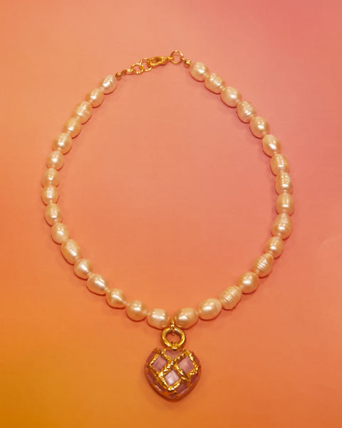 Collier en perles et pendentif cœur