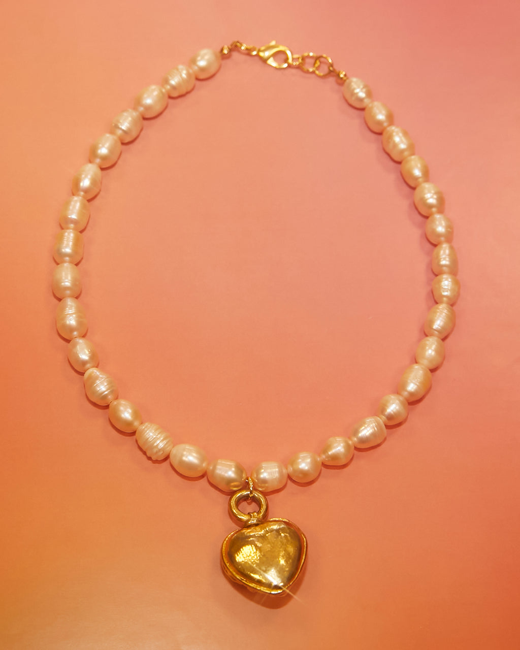 Collier en perles et pendentif cœur