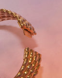 Bracelet rigide tressé