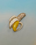 Broche banane à strass