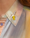 Broche banane à strass