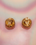 Boucles d'oreilles tourbillon et strass