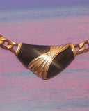 Collier noir et or