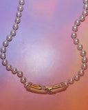 Collier perles et ornement doré