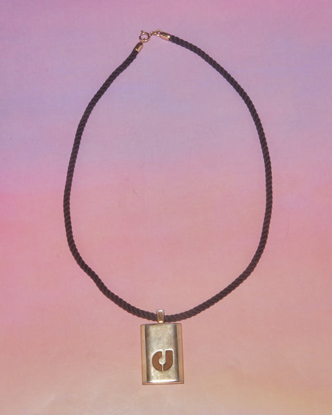 Pendentif, Charles Jourdan