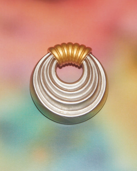 Broche dorée et argentée