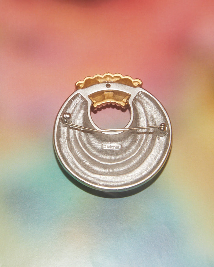 Broche dorée et argentée