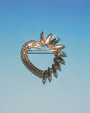 Broche coeur strass verts